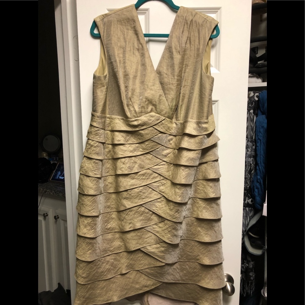 Gold simmering cocktail dress. Jessica Howard.
